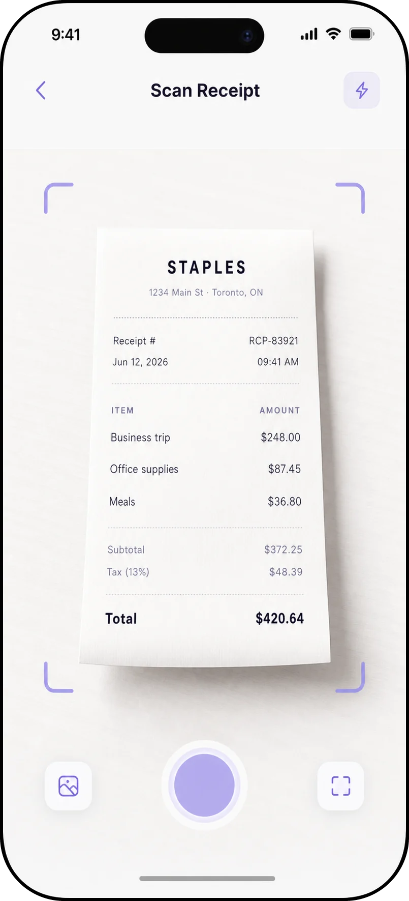 The Smart Receipts app scanning a paper store receipt, with the total and line items detected automatically.